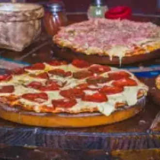Explora El Delicioso Menú De Pizzería En Paracas